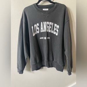 Ramona Sweatshirt Los Angeles by Anine Bing in a washed grey color.